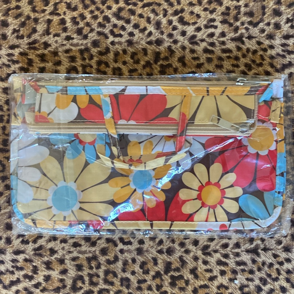 COPY - Cool multi compartment organizer bag! Pretty colors and patterns . Great…